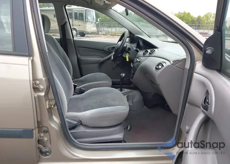 2003 Ford Focus Lx z USA, uszkodzony, nr VIN 1FAFP33PX3W167800